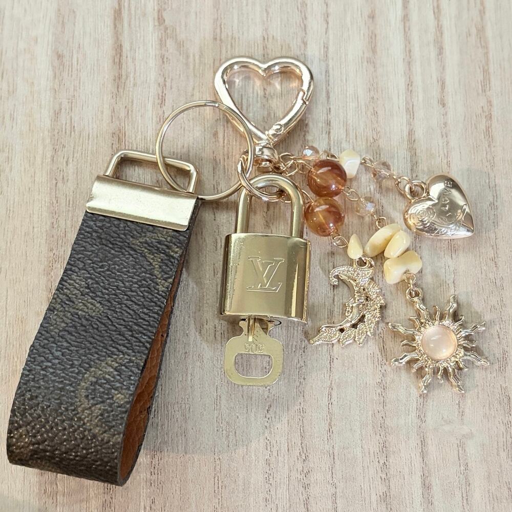 Louis Vuitton Lock & Key #305 w/an LV Canvas Loop, Sun & Heart Charm Keychain